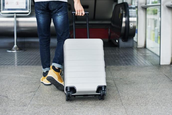 Housse de protection pour valise - Guide des Aeroports